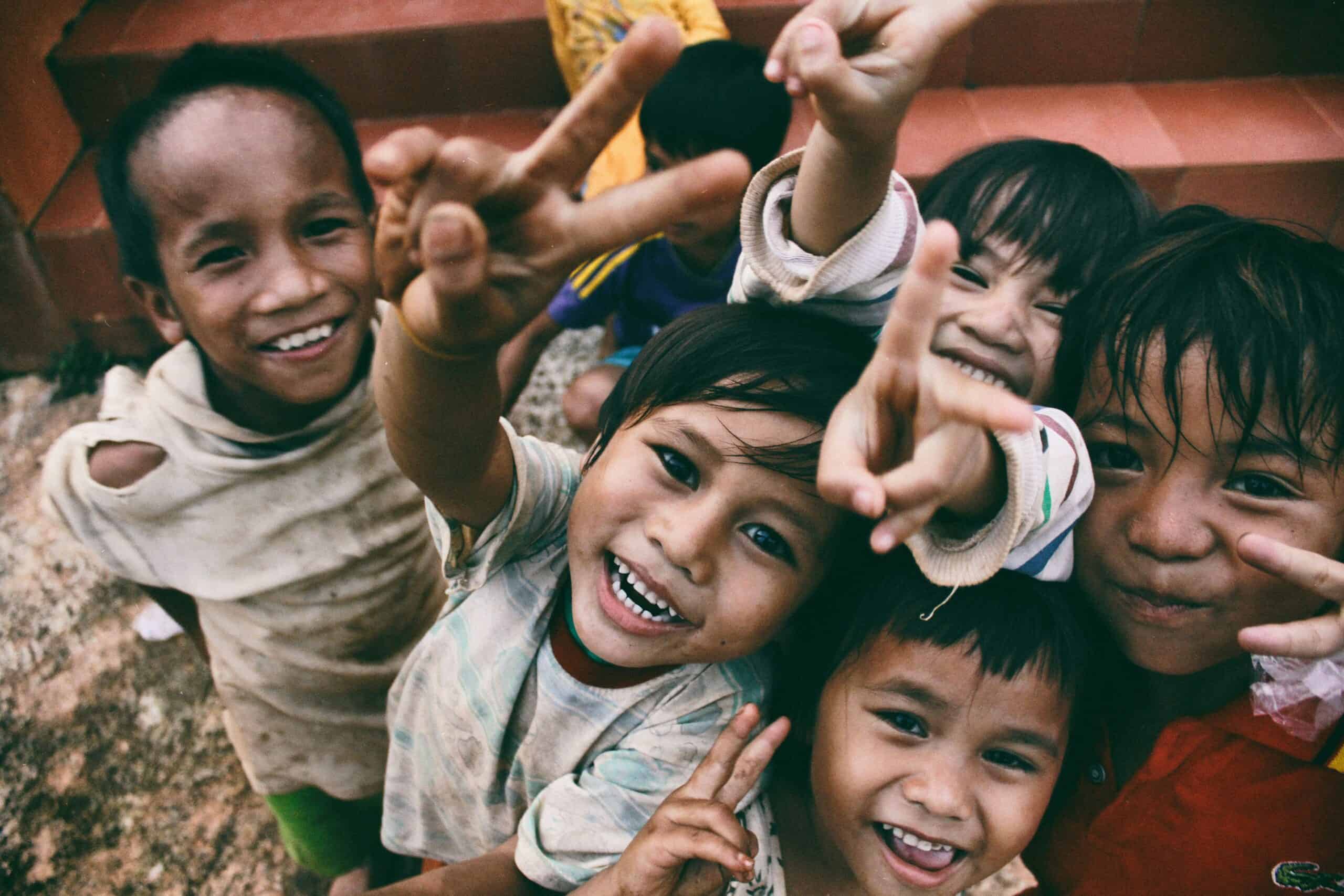 Children cheering at a community program.